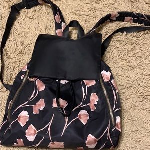 Black drawstring floral backpack